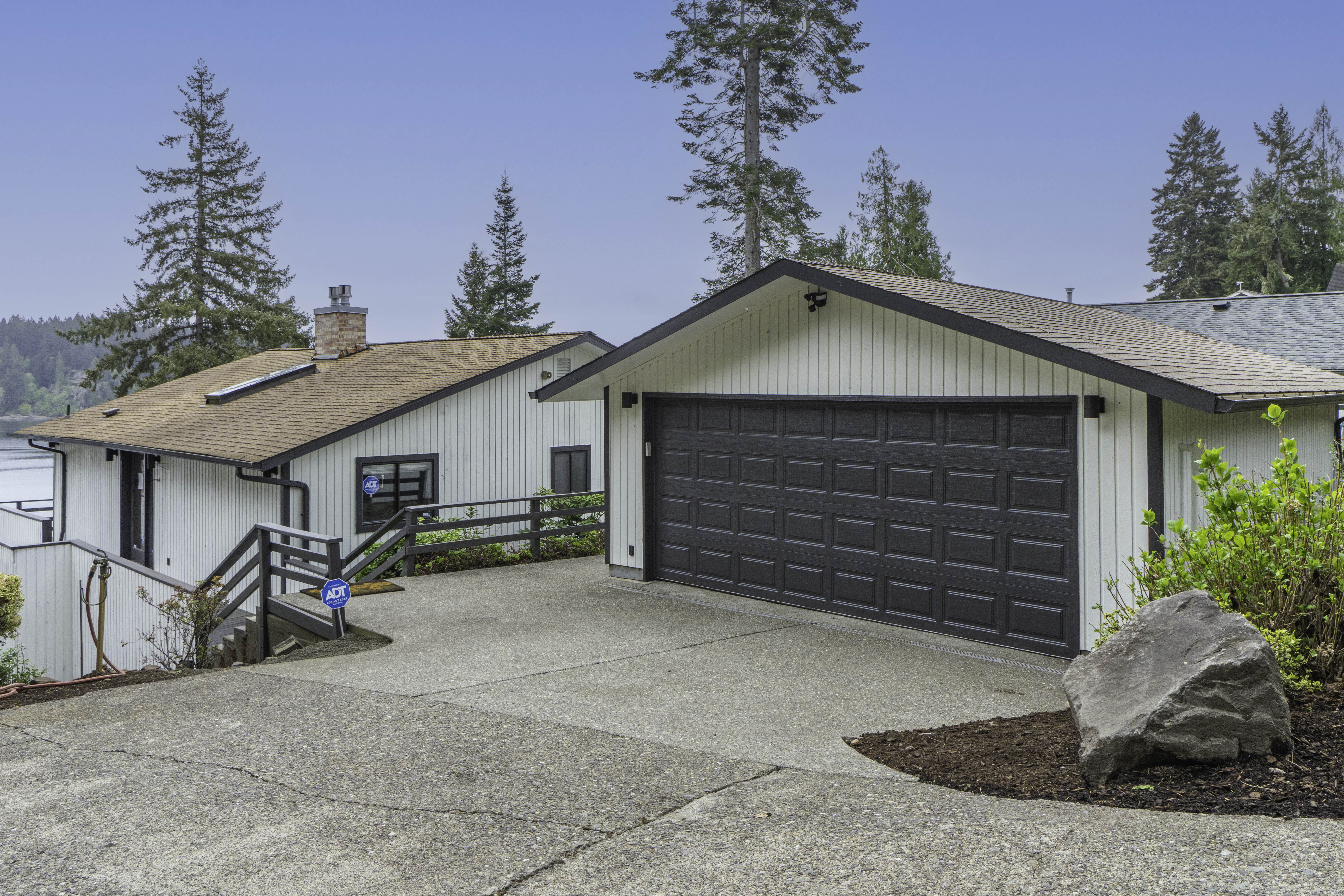 Front exterior of renovated Shelton waterfront home