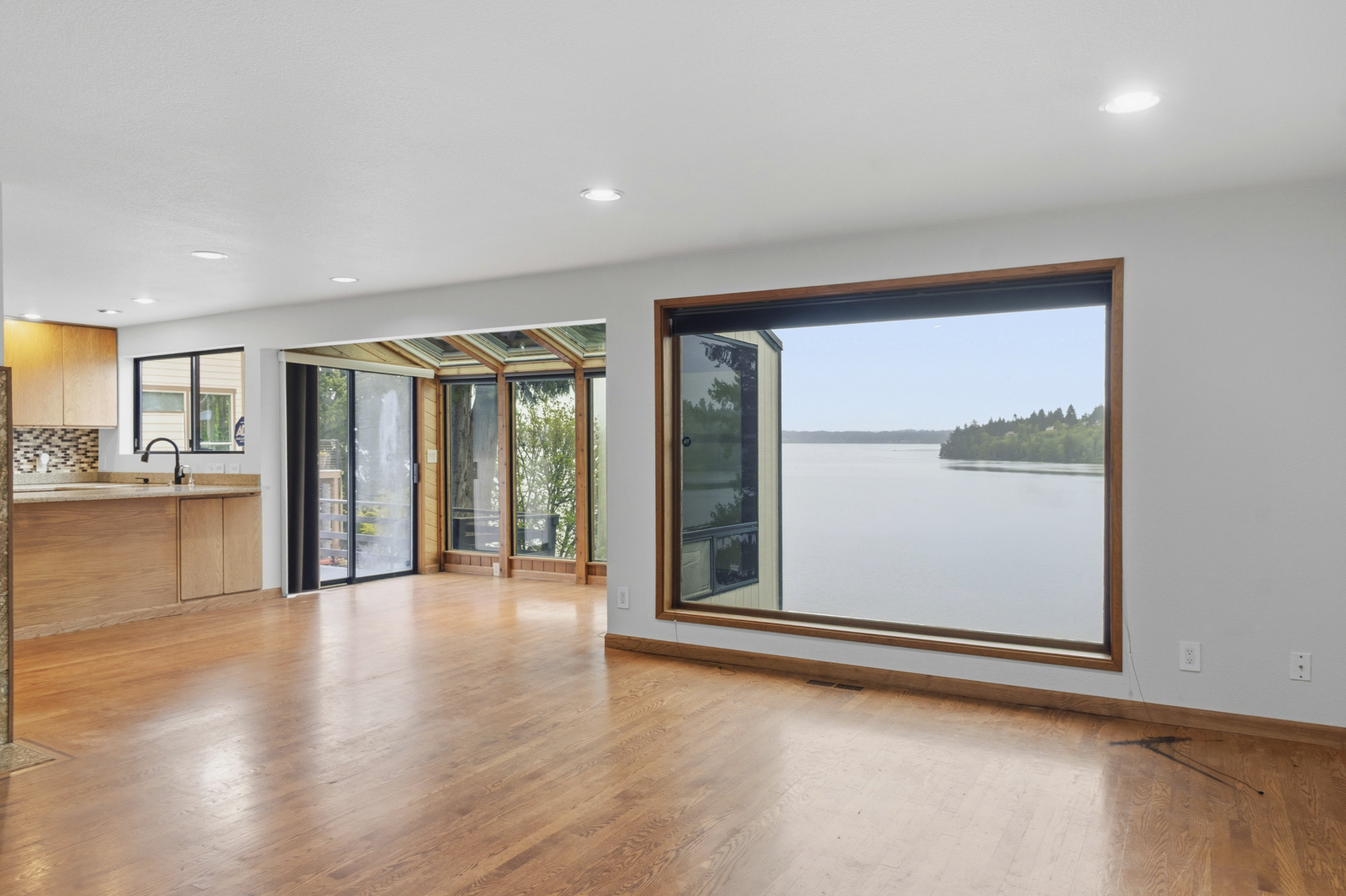 Living room with water views at Kamilche Shores